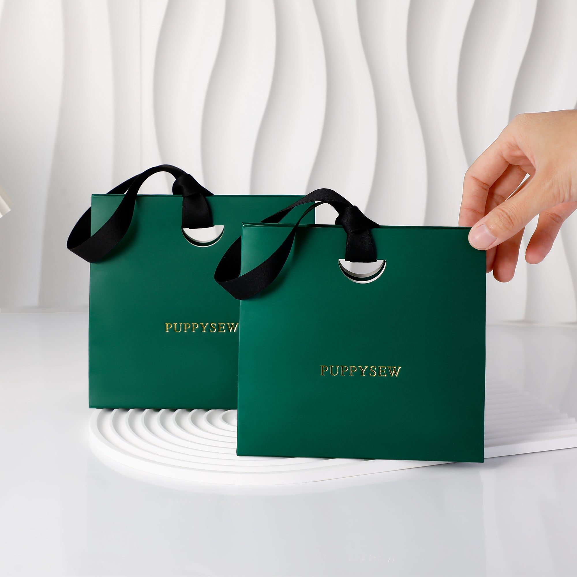 High-end satin ribbon paper bags, logo printing available, ideal for boutique packaging and wedding gifts.