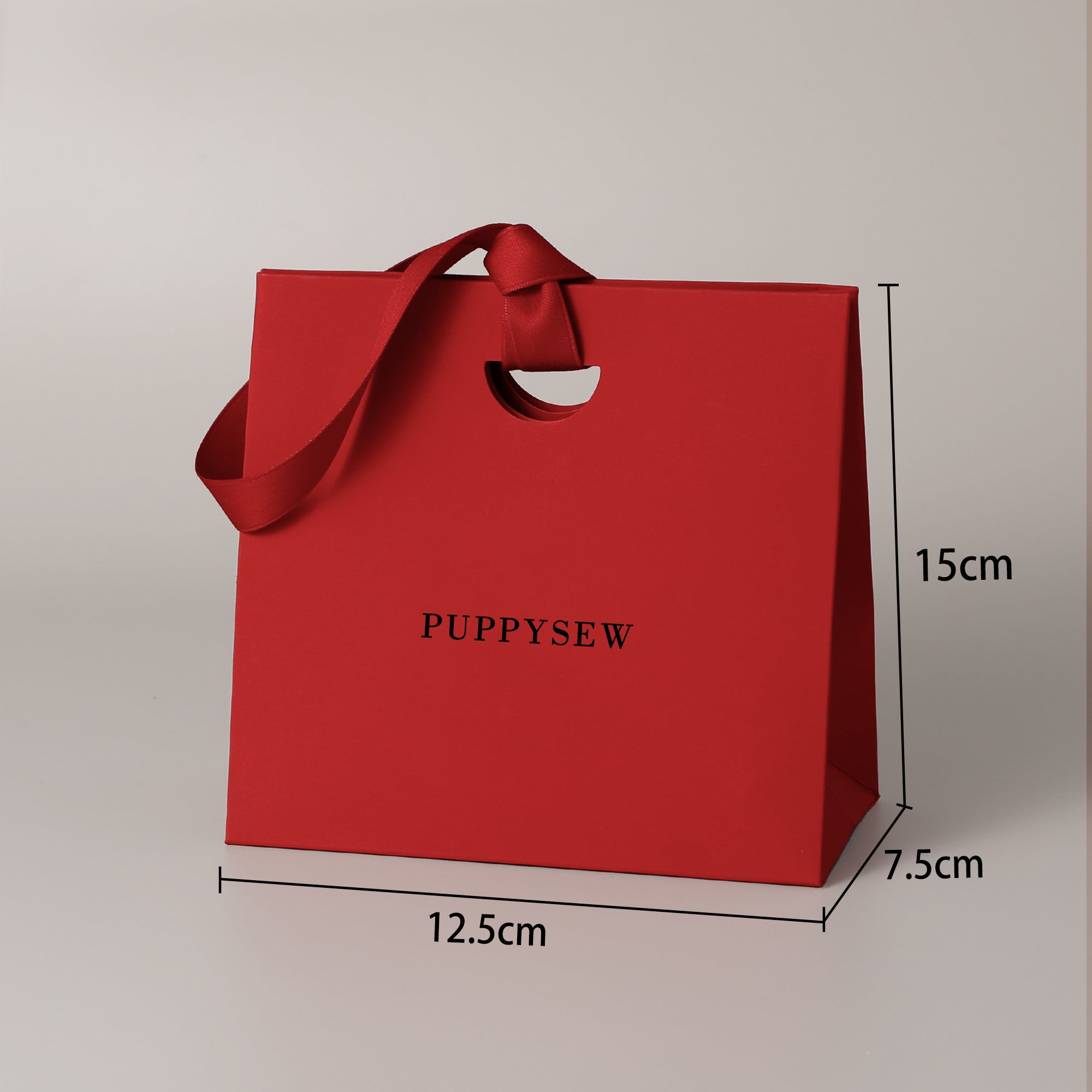 Premium paper gift bags with satin handles, perfect for wedding favors and boutique packaging.-zoom-4
